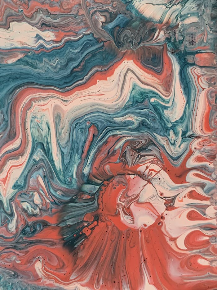 services-02 Dynamic abstract painting featuring vibrant flowing patterns in red, blue, and white hues.